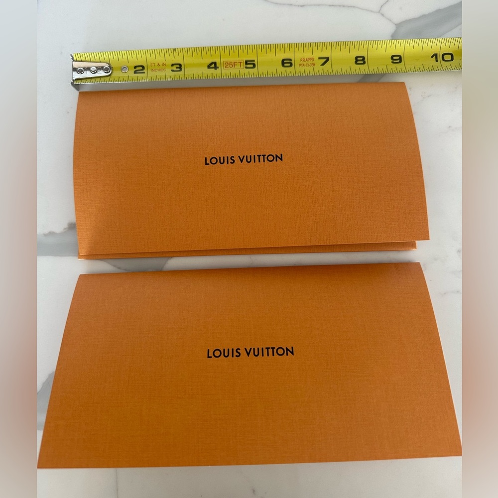 Louis Vuitton envelopes. Like new condition. Lot of 2 envelopes with literature.